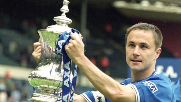 20 May 2000: Chelsea Captain Dennis Wise displays the trophy as Chelsea beat Aston Villa in the AXA FA Cup Final at Wembley Stadium in London, England. Chelsea won 1 - 0. Mandatory Credit: Ben Radford /Allsport